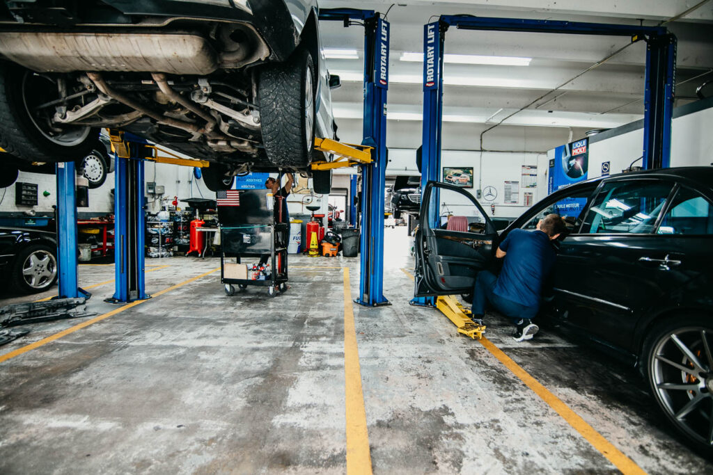 Mercedes Benz Vehicles in Service Bays at Miami Benz Workshop