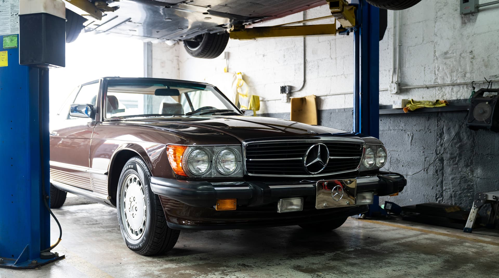 Classic Mercedes-Benz Service Bays — Miami Benz South Miami Classic Mercedes-Benz vehicles on workshop lifts at Miami Benz, South Miami classic car specialists.
